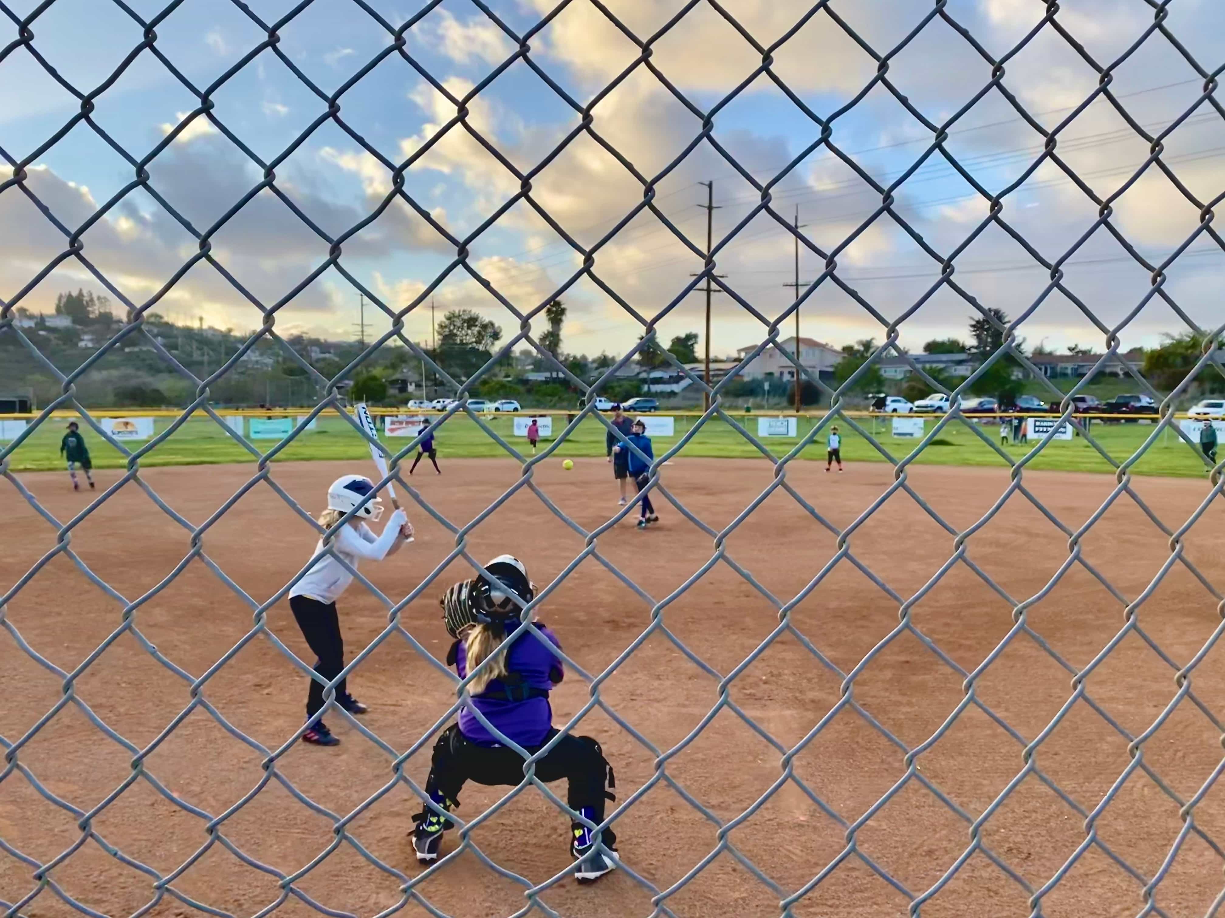 Youth softball team practicing together
